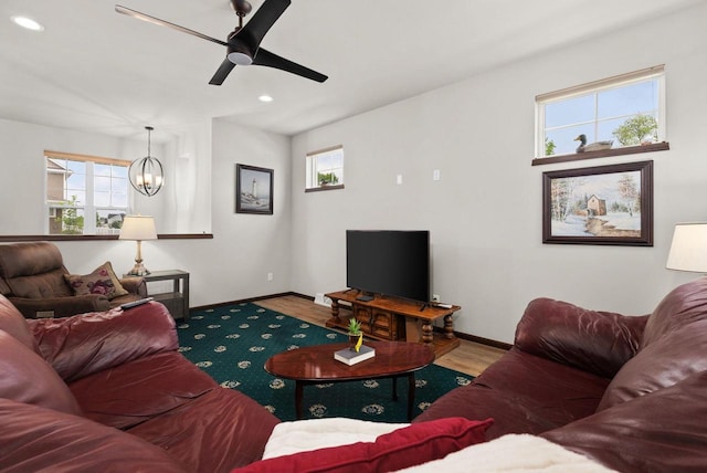 6102 Misty Bridge Rd, Madison, WI 53718 - living room with plenty of natural light, recessed lighting, a ceiling fan, a chandelier, and baseboards