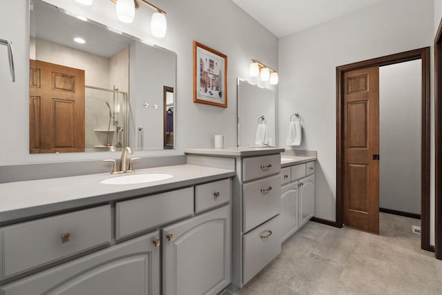 6102 Misty Bridge Rd, Madison, WI 53718 - bathroom featuring vanity and a shower with shower door