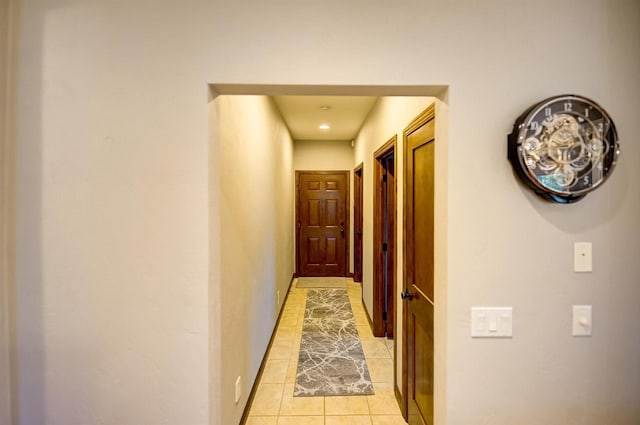 870 Eden Ct, Menasha, WI 54956 - hallway featuring light tile patterned floors and baseboards