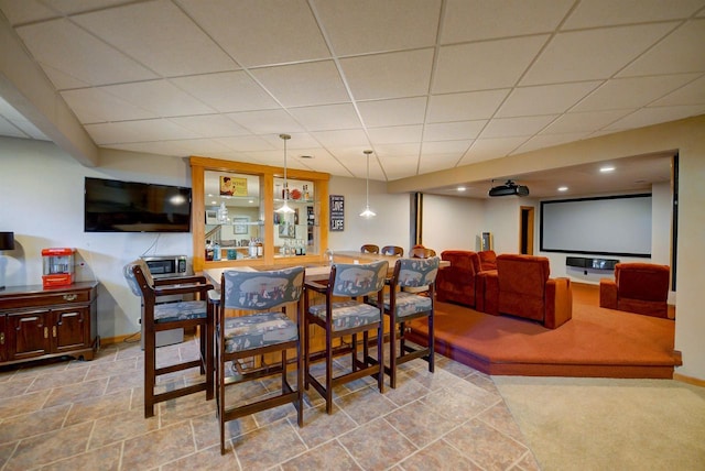 870 Eden Ct, Menasha, WI 54956 - dining room featuring a drop ceiling and baseboards