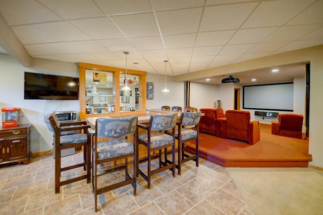 870 Eden Ct, Menasha, WI 54956 - dining area featuring baseboards and a drop ceiling