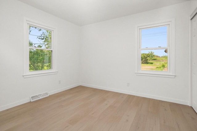 2285 N 166th St, Brookfield, WI 53005 - unfurnished room with light wood-style floors and baseboards