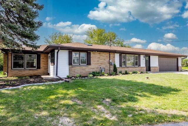 2285 N 166th St, Brookfield, WI 53005 - single story home with brick siding, a garage, a front yard, and concrete driveway