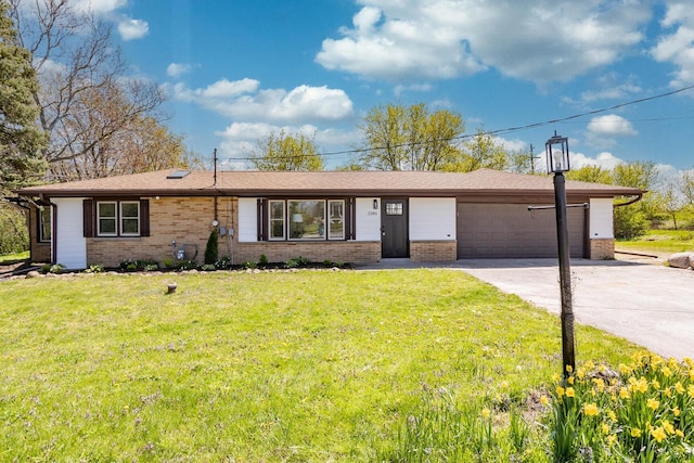 2285 N 166th St, Brookfield, WI 53005 - ranch-style house with brick siding, driveway, a garage, and a front yard