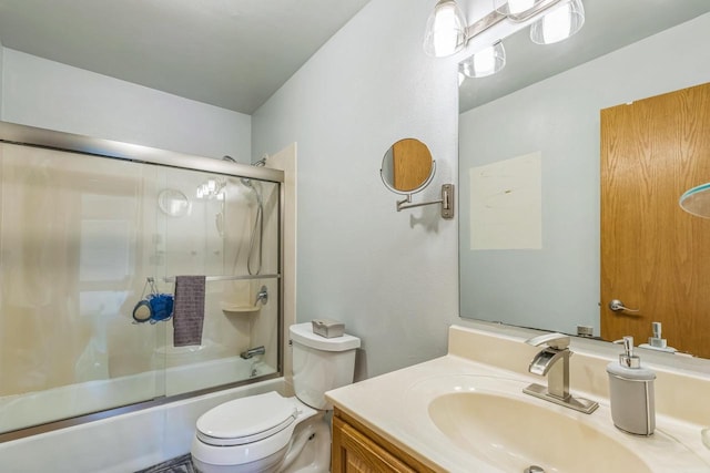 26 Waunona Woods Ct, Madison, WI 53713 - bathroom featuring enclosed tub / shower combo, vanity, and toilet