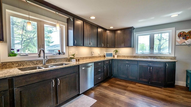 W7660 State Road 21, Wautoma, WI 54982 - kitchen with stainless steel dishwasher, a sink, plenty of natural light, light stone countertops, and recessed lighting