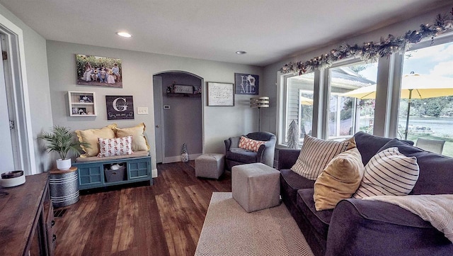 W7660 State Road 21, Wautoma, WI 54982 - living area featuring arched walkways, wood finished floors, recessed lighting, and baseboards