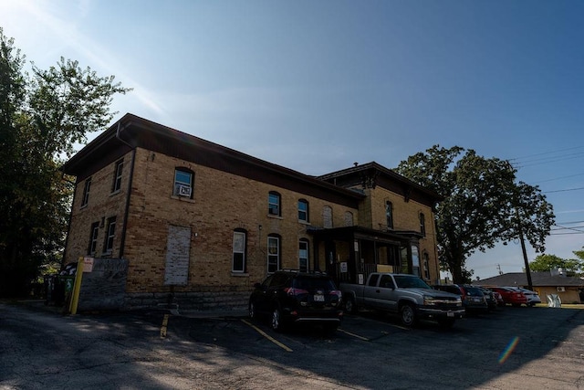 306 Wisconsin St, Oshkosh, WI 54901 - view of building exterior featuring uncovered parking