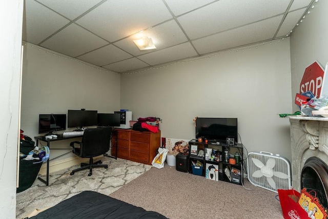 306 Wisconsin St, Oshkosh, WI 54901 - office featuring a paneled ceiling, carpet floors, and a fireplace