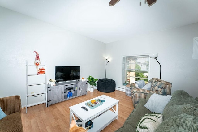 306 Wisconsin St, Oshkosh, WI 54901 - living room with light wood-style flooring, a baseboard radiator, a baseboard heating unit, and ceiling fan