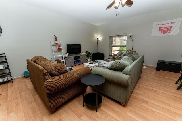 306 Wisconsin St, Oshkosh, WI 54901 - living area with light wood finished floors, ceiling fan, and baseboards