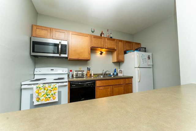 306 Wisconsin St, Oshkosh, WI 54901 - kitchen with white appliances, a sink, brown cabinetry, and light countertops