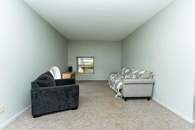 306 Wisconsin St, Oshkosh, WI 54901 - living room featuring light carpet and baseboards