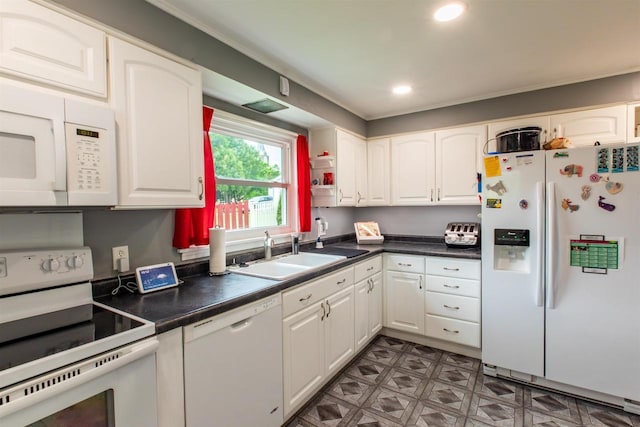 514 Doty St, Mineral Point, WI 53565 - kitchen featuring white appliances, a sink, white cabinetry, dark countertops, and recessed lighting