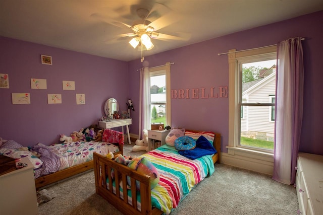 514 Doty St, Mineral Point, WI 53565 - bedroom with carpet floors, multiple windows, and ceiling fan