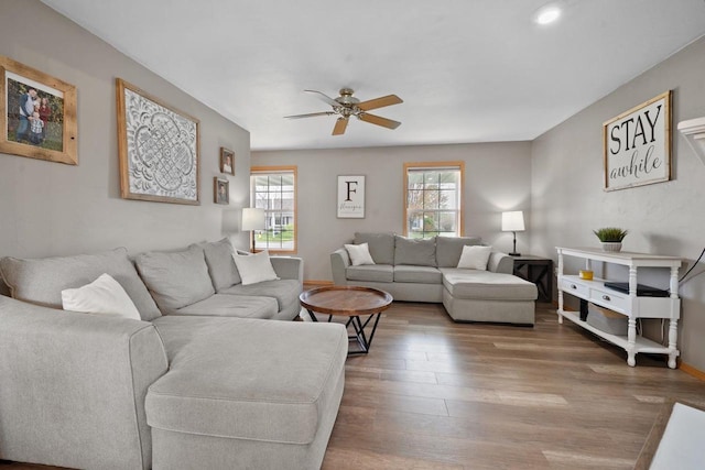 2731 Hamilton St, Oshkosh, WI 54901 - living area featuring ceiling fan, wood finished floors, baseboards, and recessed lighting