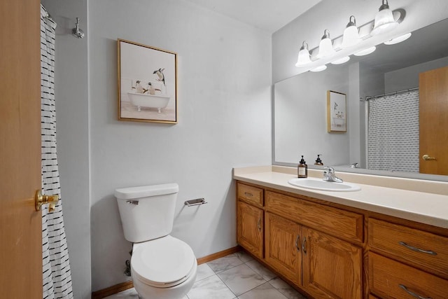 2731 Hamilton St, Oshkosh, WI 54901 - full bathroom featuring toilet, vanity, baseboards, and marble look tile flooring