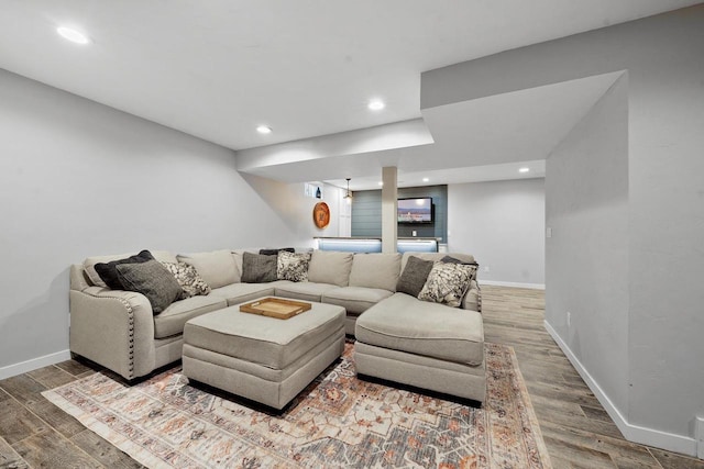 2731 Hamilton St, Oshkosh, WI 54901 - living room featuring wood finished floors, baseboards, and recessed lighting