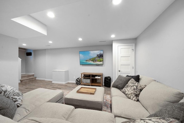 2731 Hamilton St, Oshkosh, WI 54901 - living room featuring recessed lighting, wood finished floors, and baseboards