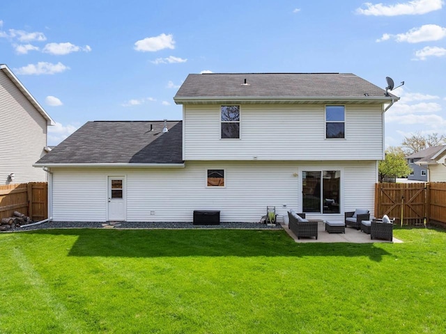 2731 Hamilton St, Oshkosh, WI 54901 - rear view of property with an outdoor hangout area and a patio area