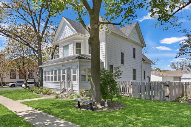 822 12th Ave, Union Grove, WI 53182 - view of property exterior featuring a shingled roof and entry steps