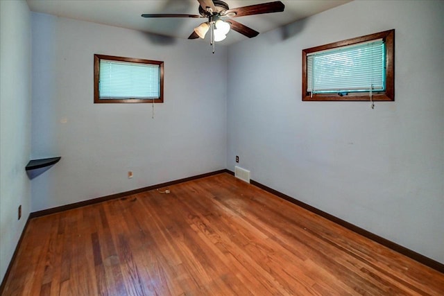 1614 Lake View Ave, Madison, WI 53704 - unfurnished room featuring a ceiling fan, baseboards, and wood finished floors