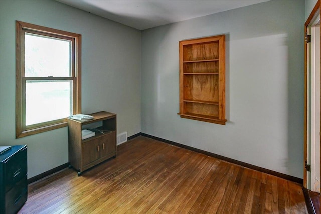 1614 Lake View Ave, Madison, WI 53704 - unfurnished room with wood-type flooring and baseboards