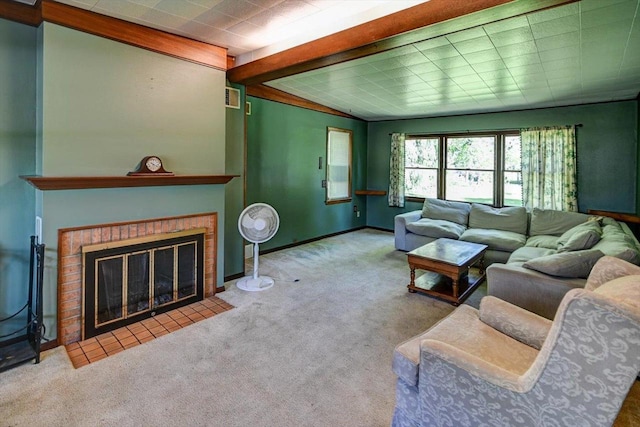 1614 Lake View Ave, Madison, WI 53704 - carpeted living room with beam ceiling, a brick fireplace, and baseboards