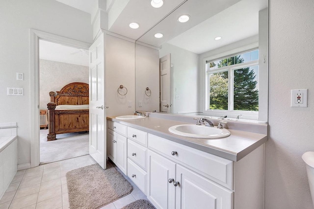 2531 Huntington Way, Suamico, WI 54173 - ensuite bathroom with double vanity, tile patterned floors, and recessed lighting