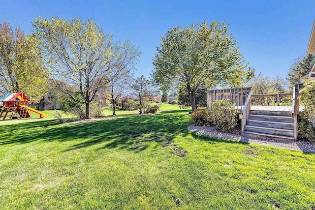 2531 Huntington Way, Suamico, WI 54173 - view of grassy yard with a playground and a deck