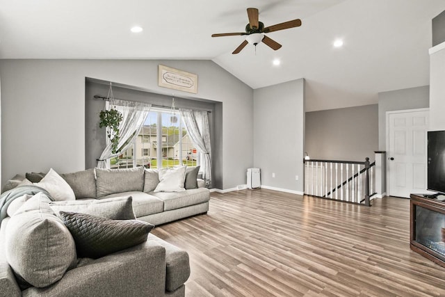 632 Grove St, Portage, WI 53901 - living room with vaulted ceiling, a ceiling fan, wood finished floors, recessed lighting, and baseboards