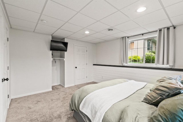 632 Grove St, Portage, WI 53901 - carpeted bedroom with a drop ceiling, baseboards, a closet, and recessed lighting