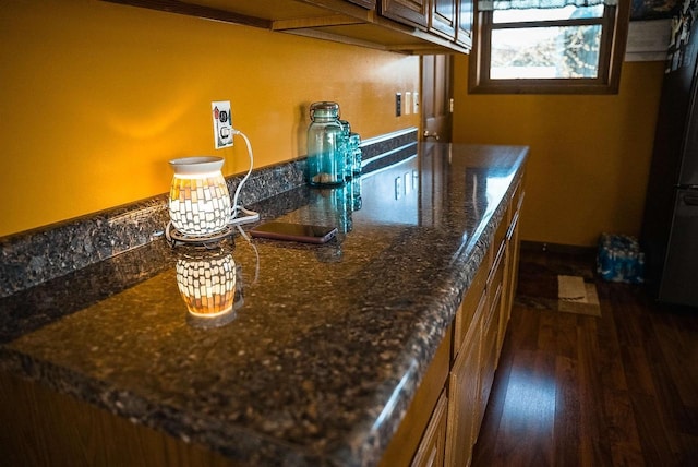 33902 County Rd N Unit L4, Hillpoint, WI 53937 - detailed view of fridge and wood finished floors