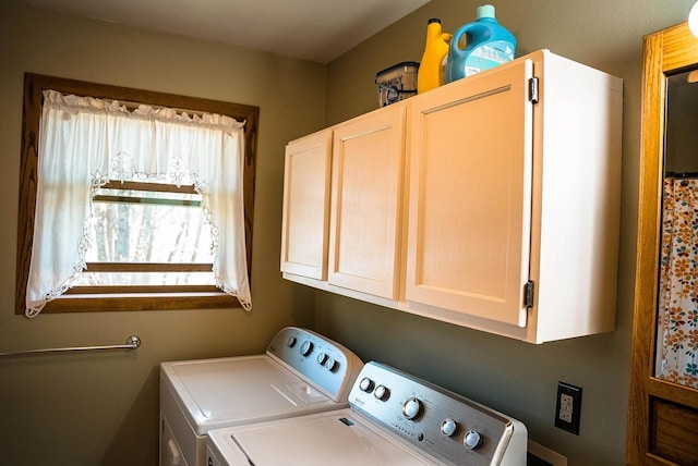 33902 County Rd N Unit L4, Hillpoint, WI 53937 - laundry room featuring washing machine and dryer and cabinet space