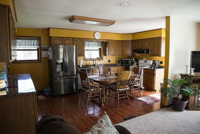 33902 County Rd N Unit L4, Hillpoint, WI 53937 - dining room featuring dark wood finished floors
