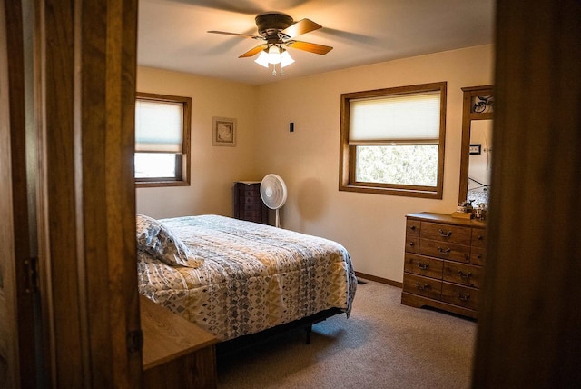33902 County Rd N Unit L4, Hillpoint, WI 53937 - bedroom featuring carpet flooring, baseboards, and ceiling fan