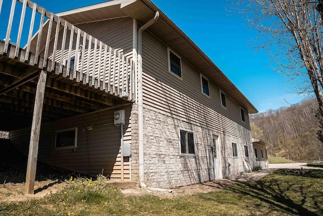 33902 County Rd N Unit L4, Hillpoint, WI 53937 - view of home's exterior with stone siding
