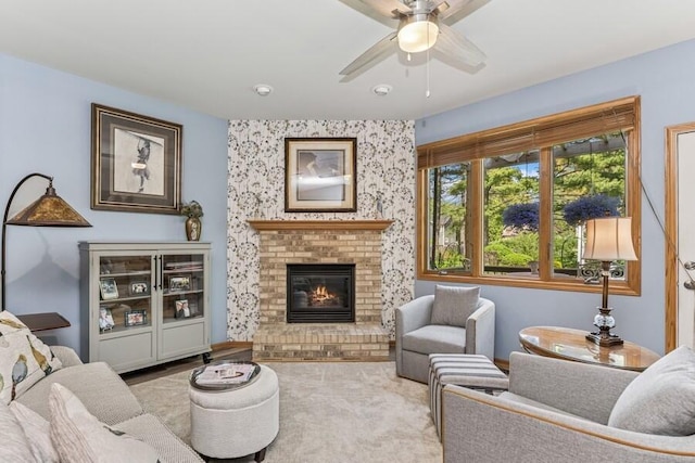 226 N Main St Unit 6, Walworth, WI 53184 - living area with a ceiling fan, a brick fireplace, and carpet