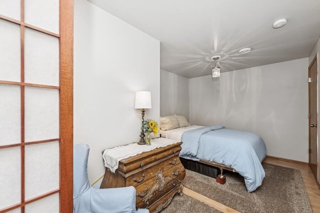 226 N Main St Unit 6, Walworth, WI 53184 - bedroom with wood finished floors and baseboards