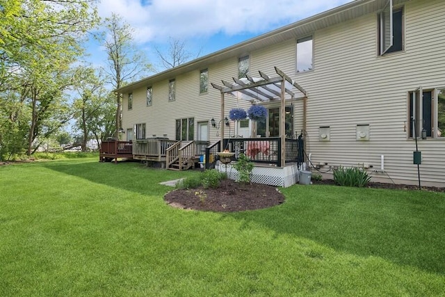 226 N Main St Unit 6, Walworth, WI 53184 - back of house featuring a pergola, a wooden deck, and a yard