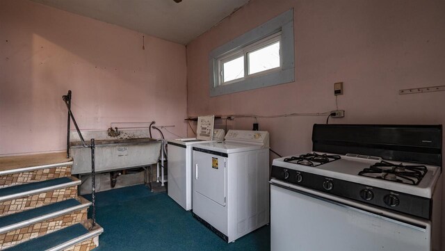 N2145 Lind Center Rd, Waupaca, WI 54981 - washroom with washing machine and clothes dryer and dark colored carpet