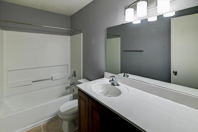 7102 Flagship Dr Unit 8, Madison, WI 53719 - bathroom featuring toilet, bathing tub / shower combination, vanity, and tile patterned flooring