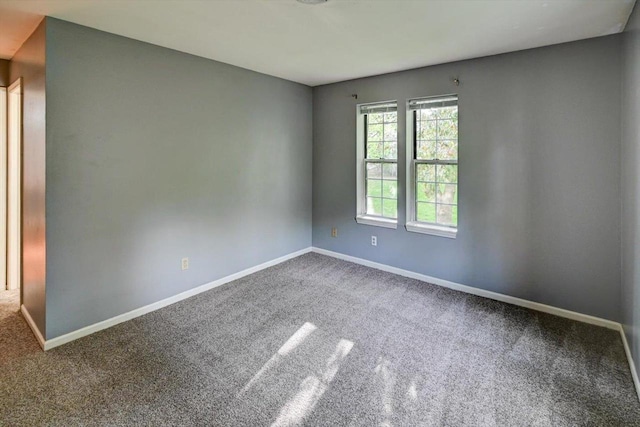 7102 Flagship Dr Unit 8, Madison, WI 53719 - spare room featuring carpet flooring and baseboards