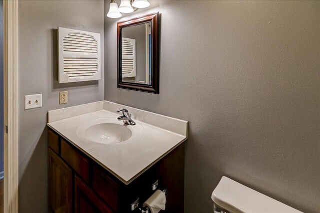 7102 Flagship Dr Unit 8, Madison, WI 53719 - bathroom featuring vanity and toilet