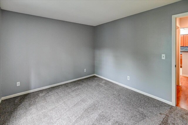 7102 Flagship Dr Unit 8, Madison, WI 53719 - unfurnished room with carpet floors and baseboards