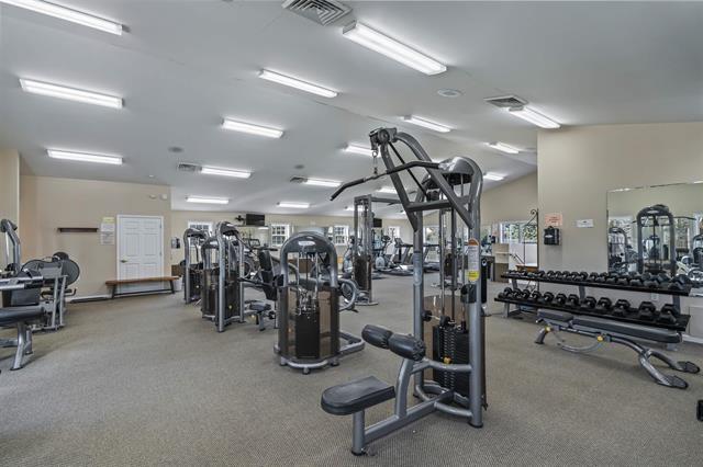 7102 Flagship Dr Unit 8, Madison, WI 53719 - exercise room with carpet floors and lofted ceiling