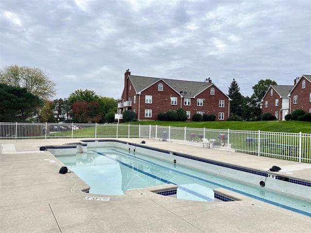 7102 Flagship Dr Unit 8, Madison, WI 53719 - view of pool featuring fence