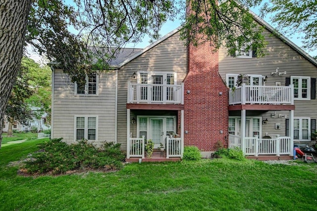 7102 Flagship Dr Unit 8, Madison, WI 53719 - back of house featuring a yard