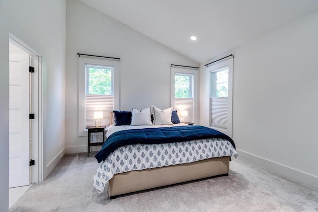 810 Farwell Dr, Madison, WI 53704 - bedroom featuring vaulted ceiling, carpet floors, multiple windows, baseboards, and recessed lighting
