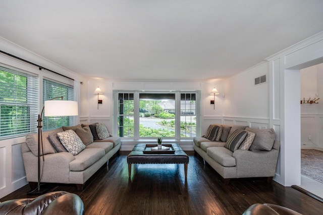 810 Farwell Dr, Madison, WI 53704 - living room with a decorative wall, hardwood / wood-style flooring, plenty of natural light, ornamental molding, and wainscoting